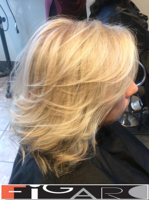 Platinum Highlights Medium layers Hair cut by Figaro Hair Salon Director